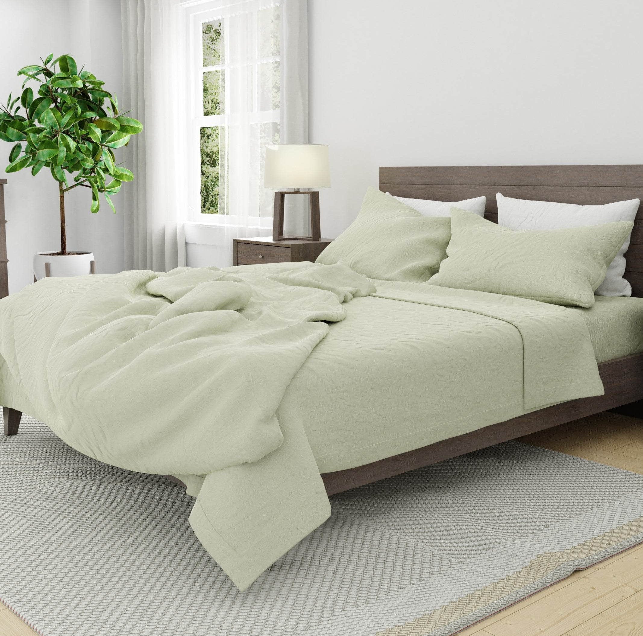 Bed with Linen Duvet Cover in Seafoam and Linen Pillowcases in White